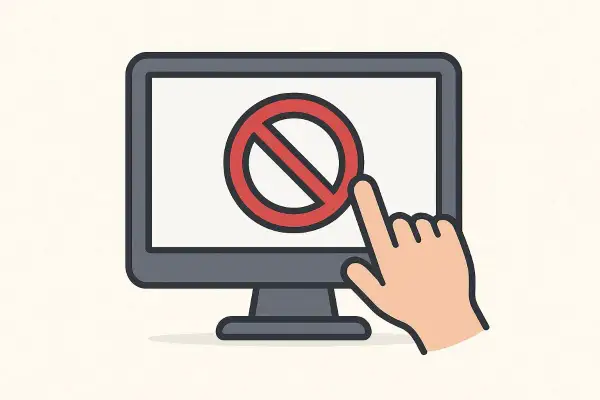 Palec wskazujący dotyka czerwonego symbolu zakazu na ekranie komputera, ilustrując, jak zablokować stronę internetową.